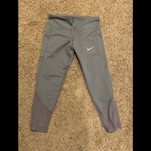 Women’s Nike Dry Fit workout tights size M. NEW